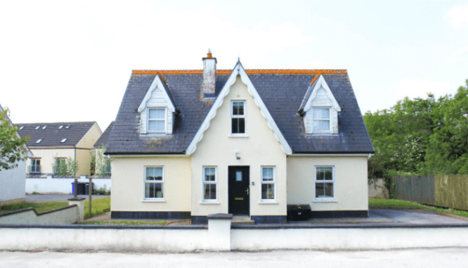 A photo of a house represents the topic of buying a bank owned home.