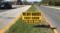 A we buy houses sign that has pros and cons.