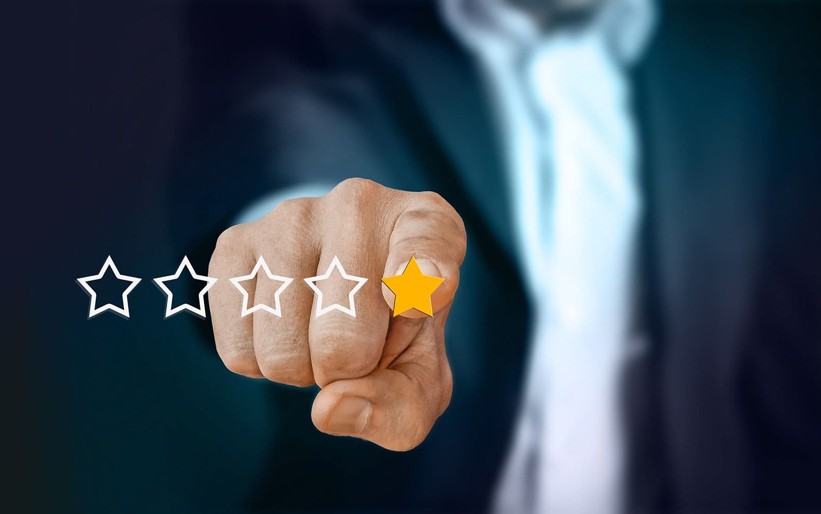A hand points at a one-star review or testimonial rating, with the other three stars being empty outlines.